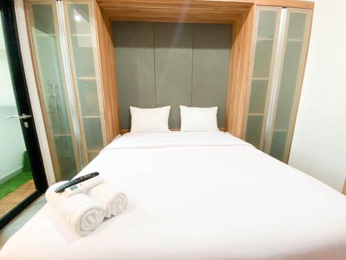 Jatingaleh Apartamento | Cozy and Tidy 1BR The Alton Apartment By Travelio