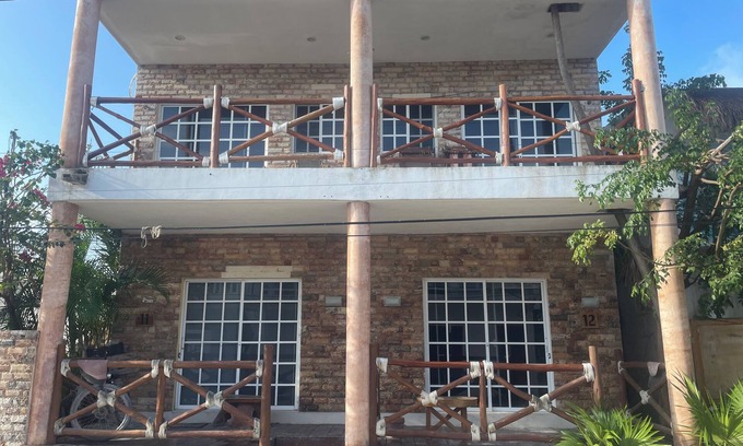 Downtown Holbox Apartamento | Cozy apartment in charming Holbox with AC, WiFi cuarto en planta baja