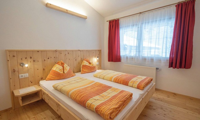 Caminata di Tures Apartamento | Acogedor 'Apartamento Enzian' con vistas a la montaña, Wi-Fi, jardín y terraza.