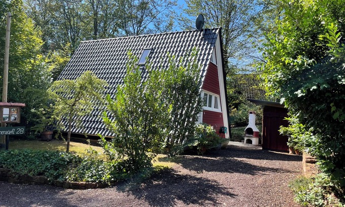Feriendorf Eichwald Casa | Acogedora casa de campo con sauna al aire libre y aire acondicionado.
