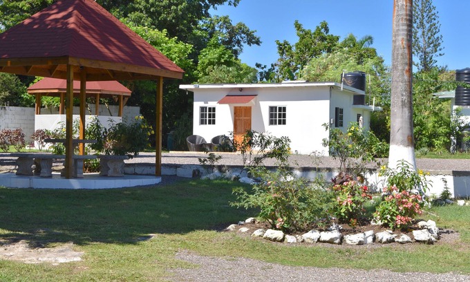 Mammee Bay Apartamento | Acogedora casa de campo, a 5 minutos a pie de la playa, hermoso jardín perfecto lugar de relajación