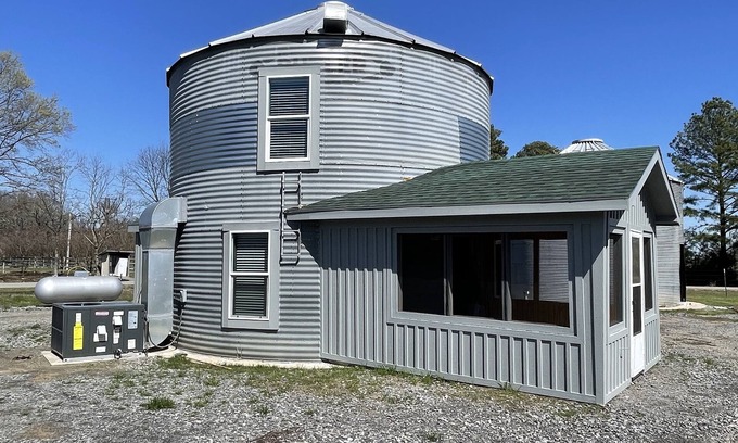 Gregory Cabina | Cozy Grain Bin Retreat on a Mini Farm.