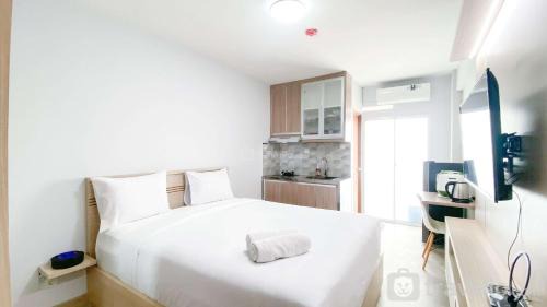 Cinere Apartamento | Cozy Living and Homey Studio Room Cinere Resort Apartment By Travelio