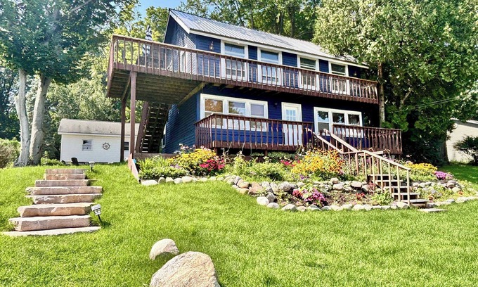 Rapid City Casa | Cozy Main Level Torch Lake Stay with Private Entry & Fire Pit