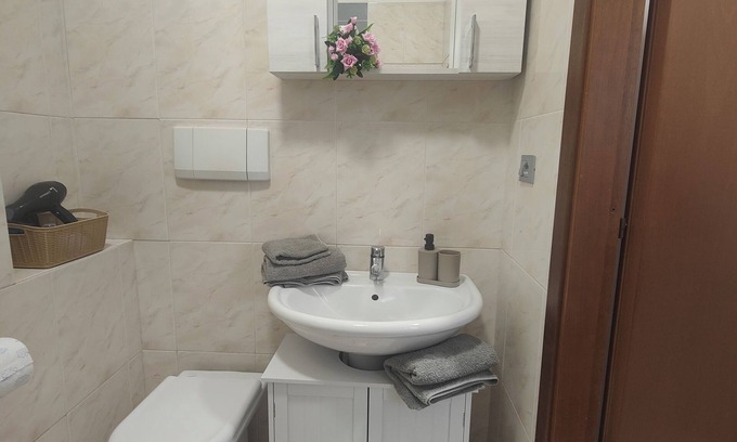 Cuneo Nuova Casa | Cozy one-bedroom apartment in the heart of Cuneo perfect for any business.