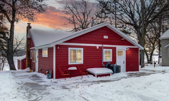 Clear Lake Casa | Cozy red cabin on Briggs Lake Chain w/ boat house