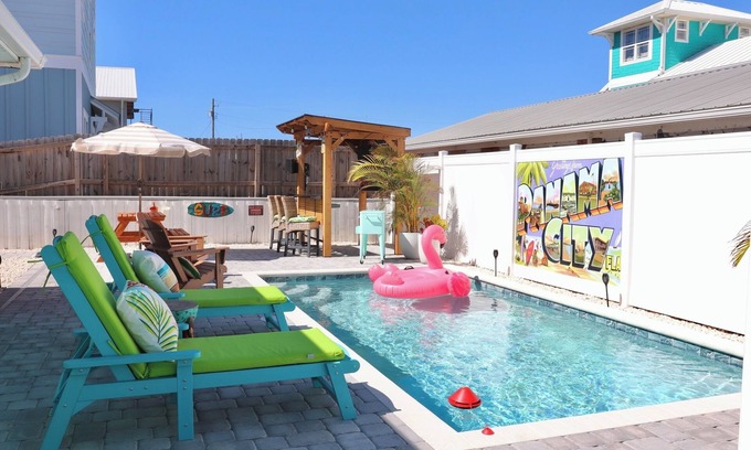 Bel Air Casa | Cozy Retreat , steps to the beach, heated pool , gulf views & huge party Deck