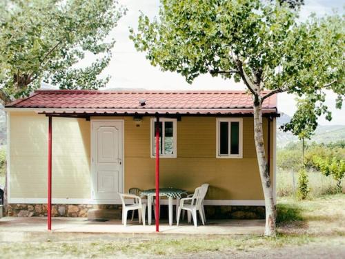 La Puebla de Roda Casa | Cozy Rustic Bungalow with Pool