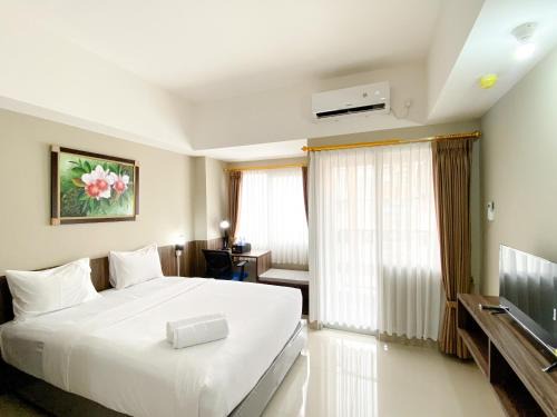 Duren Sawit Apartamento | Cozy Stay Studio Apartment at Gateway Park LRT City Jatibening By Travelio