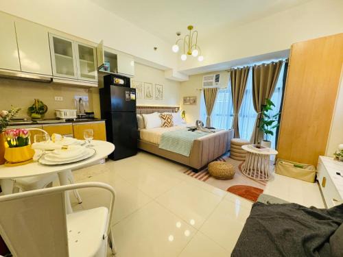 Pinagsama Apartamento | Cozy Studio in Viceroy Near Venice Mall