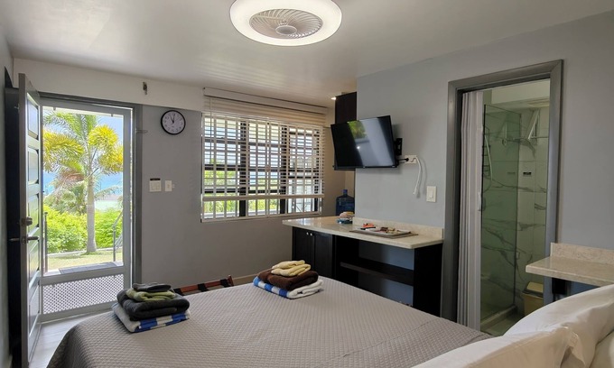 St. John's Apartamento | Cozy Studio with Seaview. Beach nearby/ On-site car rental/ Very comfortable bed