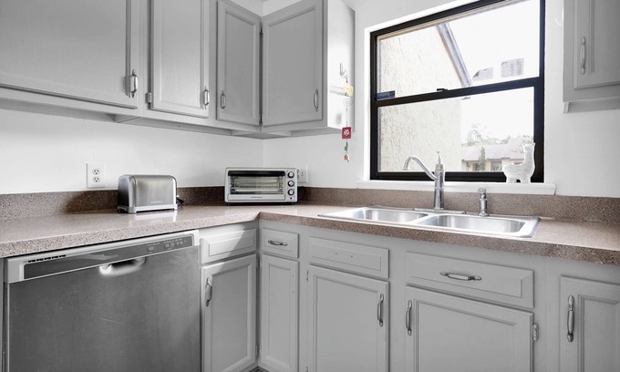 Southside Casa | Cozy townhouse, centrally located with garage and fenced yard.