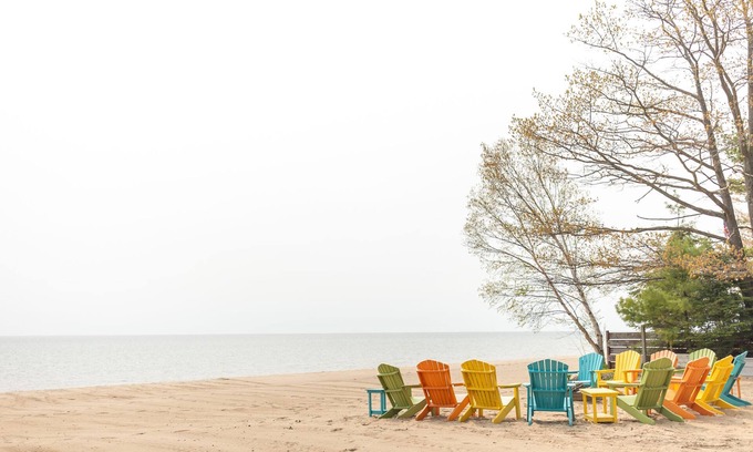 Au Sable Cabaña | Cozy cabin on Lake Huron! Firepit, grills, patio chairs and more!