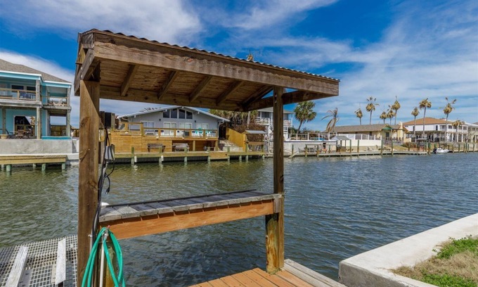 City-by-the Sea Casa | Crazy about fishing? Check out this home on deep canal near Estes Flats, Redfish Bay, and the Intracoastal Waterway!