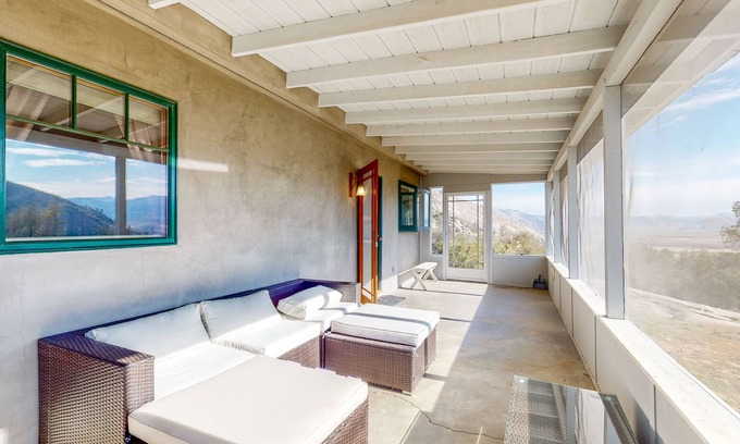 Weldon Casa | Custom-crafted acreage with sunroom & clawfoot tub