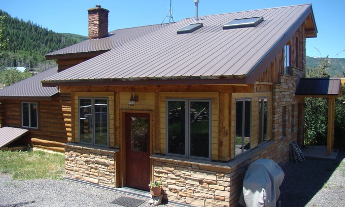 Mesa Casa | Custom log house located on the Grand Mesa one mile from Powderhorn Ski Resort.