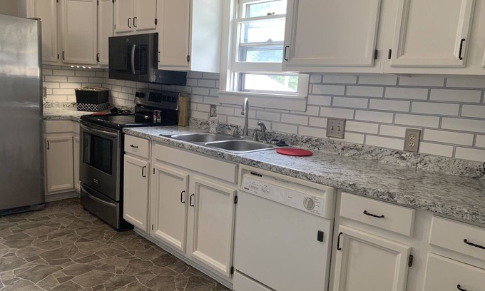 Fort Scott Casa | Cute, Convenient, in town on the main St, cozy 4 bedroom house