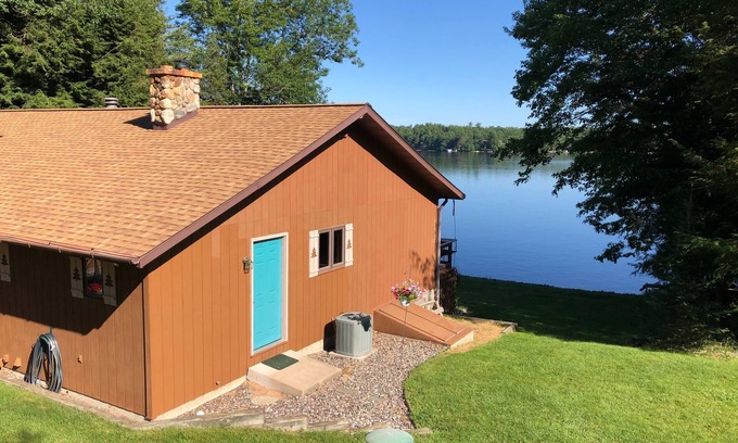 Eagle River Casa | Dam Lake Home ~ Steps from the waters edge on the Sugar Camp Chain