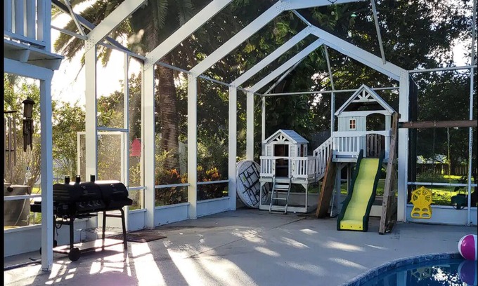 Daytona Beach Casa | Daytona Beach pool, playset, GAME ROOM hot tub, 5 bedroom home