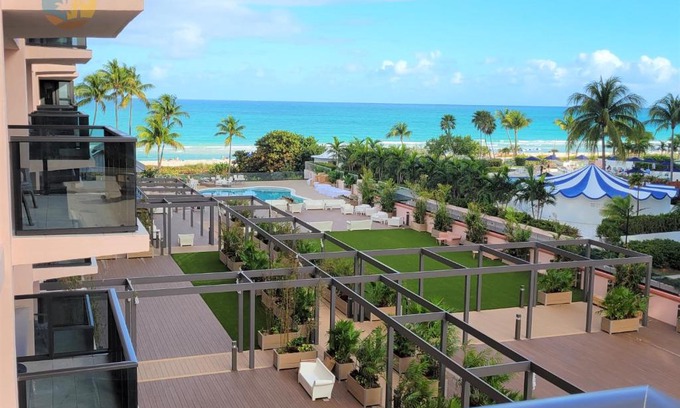 Mid Beach Apartamento | Deluxe Beach Resort - HORA RENTALS