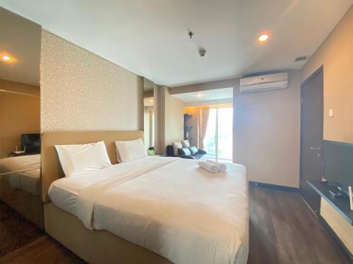 Braga Apartamento | Deluxe & Well Appointed 2BR at El Royale Apartment By Travelio