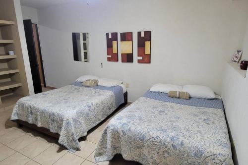 Zona Centro Apartamento | Departamento 2 camas matrimoniales K, wifi, Aire acondicionado, estacionamiento cruzando calle