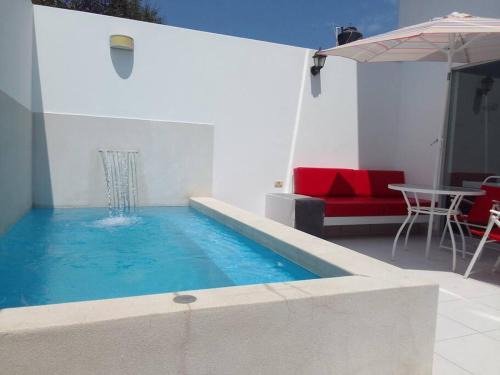 Asia Apartamento | Departamento en playa Chocaya. Disfruta del mar, la piscina y la tranquilidad.