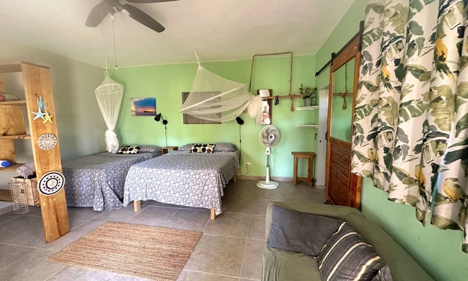 ProCab Casa | Design Garden Loft cerca de la playa en el exuberante jardín tropical w. Lección de cometa :)