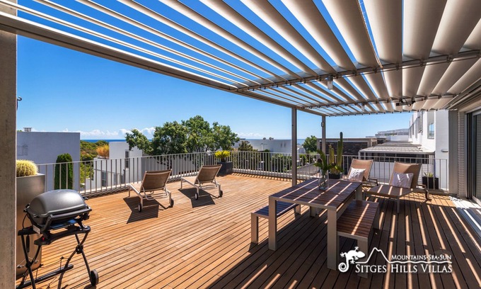 Sant Pere de Ribes Apartamento | Apartamento de diseño Casa Del Mar con aire acondicionado, piscina comunitaria y vistas al mar