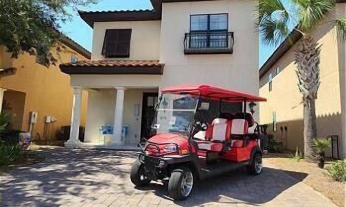 Villa Lago Casa | Designer Golf View Beach Home with 6 Seat Golf Cart