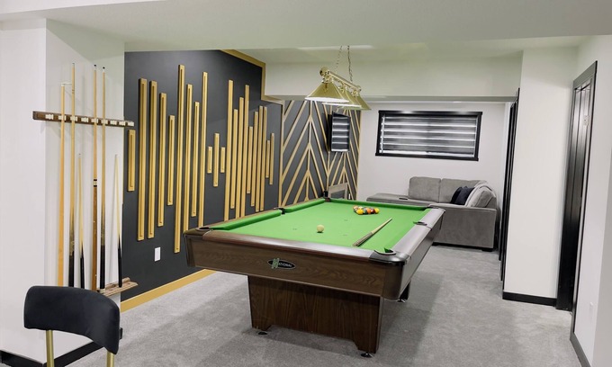 Airdrie Casa | Designer suite with a Pool Table/Xbox/Arcade/Jumbo Jenga
