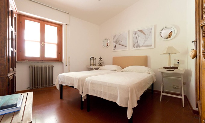 Punta Ala Casa | Villa de diseño con espléndidas vistas a la bahía de Punta Ala, dos terrazas y jardín.