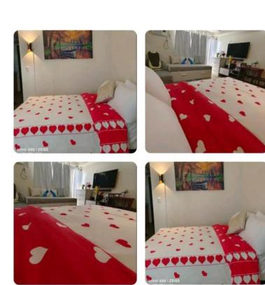 Socorro Apartamento | DG CONDOTEL @MANHATTAN PLAZA T2 STUDIO WITH BALCONY , 50 INCH TV AND UNLI WIFI @Araneta Cubao Quezon City Philippines