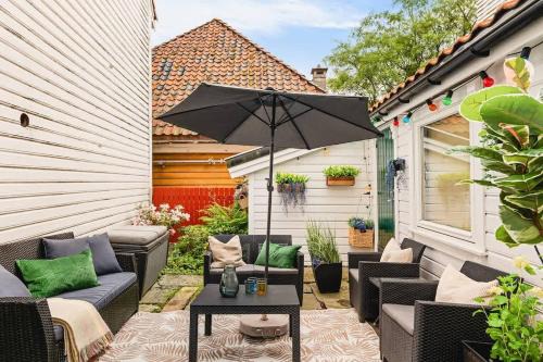 Sentrum Casa | Dinbnb Apartments I Family Dream in Bergen I Playroom I Private Garden