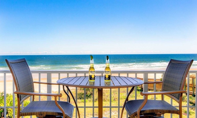 Seawinds Condo Condominio | Direct oceanfront corner condo with large balcony, beachfront pool, and garage parking