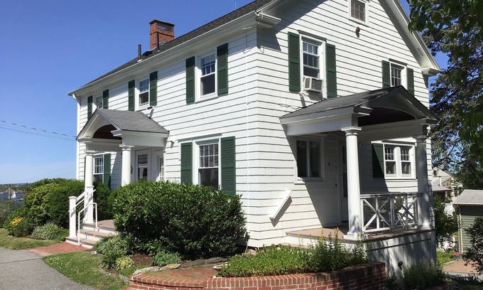 Loveitts Field Casa | Distinguished classic coastal home overlooks Casco Bay and Maine’s rocky shore!