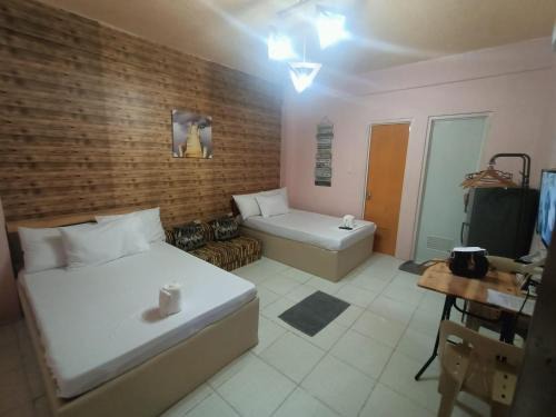 Cabanatuan Apartamento | DJCI Apartelle Walk to Robinson & NE Pacific Mall 3 Min to SM Cabanatuan