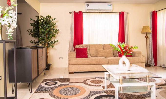Buckleys Village Apartamento | Doc's Paradise Red Apartment