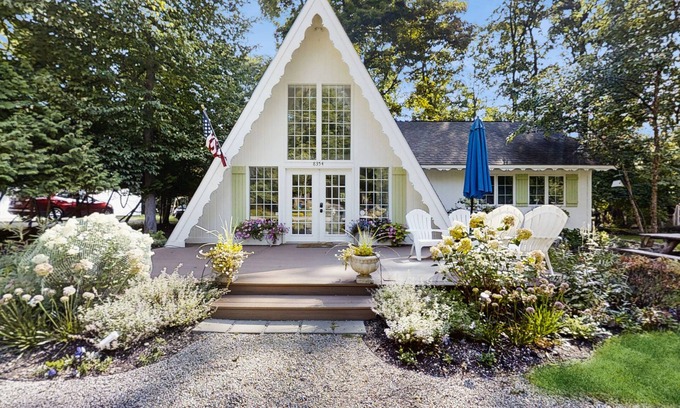 Charlevoix Casa | Dog-friendly A-frame home near beaches & downtown with firepit, deck, badminton
