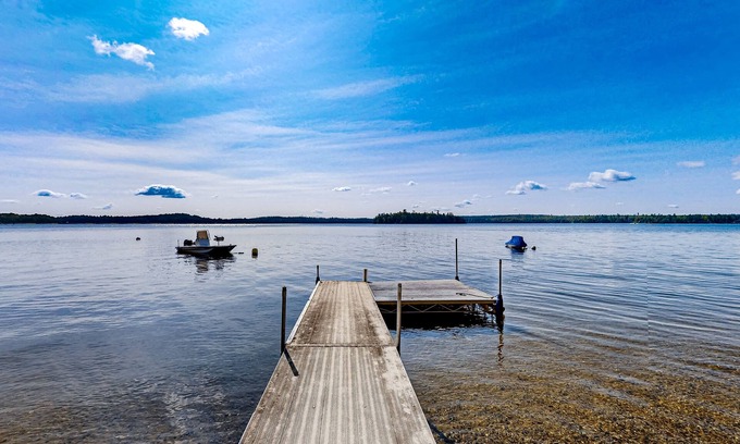 Ellsworth Cabina | Dog-friendly beach home on Green Lake with views, fireplace, dock, canoe & kayak