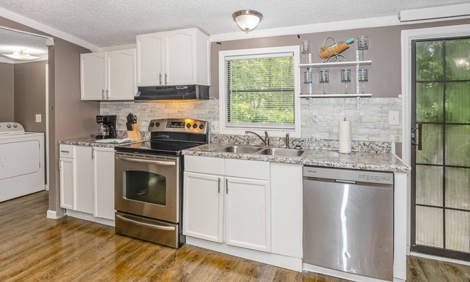 Shallotte Casa | Dog-friendly home in a prime location with a yard, patio, washer/dryer, and AC