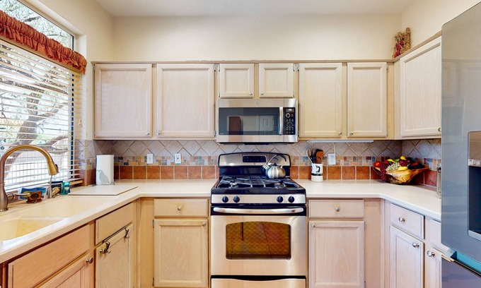 Rancho Vistoso Casa | Dog-friendly home with pool, hot tub, tennis, gym, patio, on-site restaurant, AC