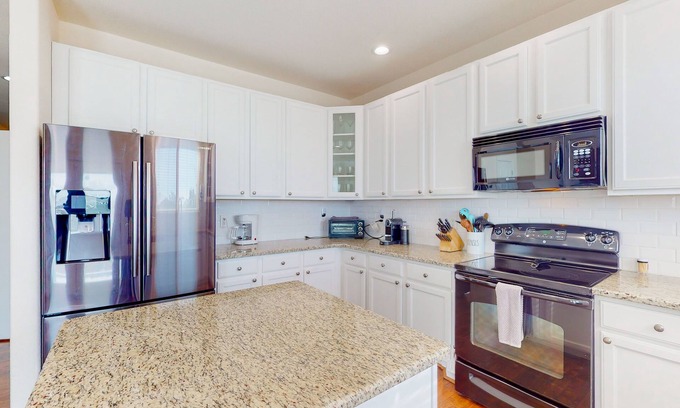 Fountain Casa | Dog-friendly home with hot tub, enclosed yard, fireplace, washer/dryer, & AC