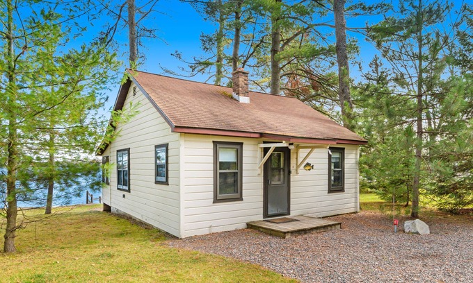 Presque Isle Cabina | Dog-friendly lakefront resort with swimming, fishing, boating, & rec room