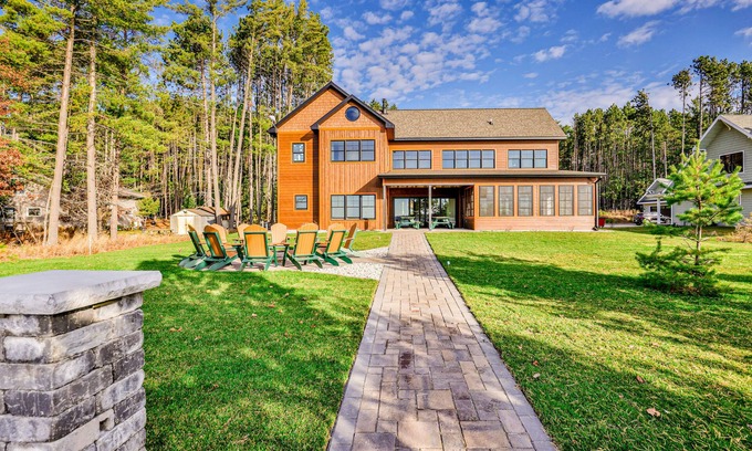 St Germain Casa | Dog-friendly lakefront home with firepit, 2 grills, fireplace, dock, & kayaks