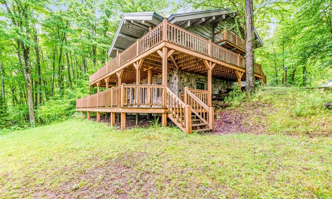 Presque Isle Casa | Dog-friendly, lakefront home with a wood fireplace, decks, dock, & AC