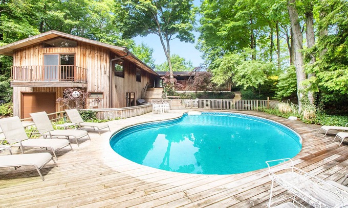 Harbert Casa | Dog-friendly lakefront house with private hot tub, outdoor pool, beach, WiFi
