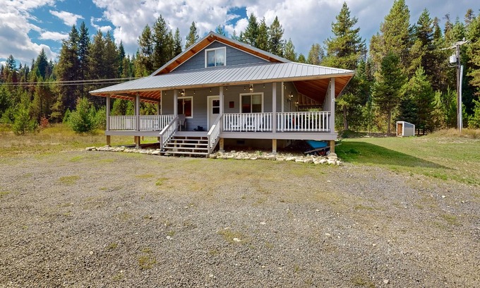 Elk City Casa | Dog-friendly riverfront home near town with deck, water views, & fireplace