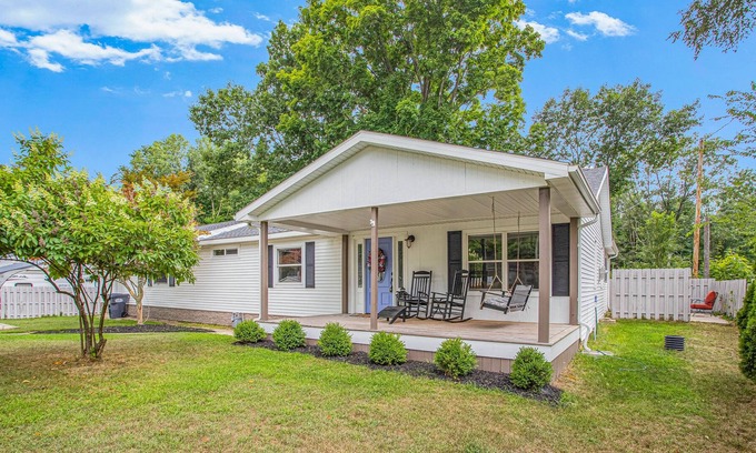 Paw Paw Lake Casa | Dog-friendly, updated home with deck, front porch, fire pit, WiFi, & fireplace
