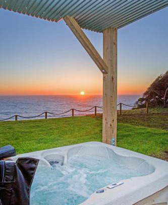 Shelter Cove Apartamento | Dolphin by OceanviewHotTubs Oceanfront Shelter Cove Tesla